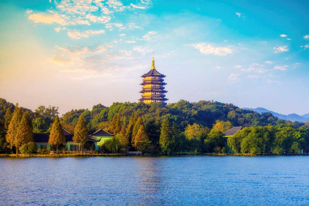Serene Hangzhou West Lake at dawn with classical gardens - GioTrip UNESCO Heritage Tour